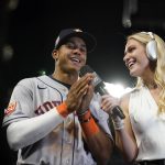 
              Houston Astros' Jeremy Pena, left, takes part in an interview after the team's 13-6 win over the Los Angeles Angels in a baseball game Friday, April 8, 2022, in Anaheim, Calif. (AP Photo/Marcio Jose Sanchez)
            