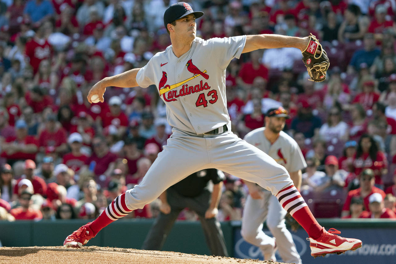 St. Louis Cardinals starting pitcher Dakota Hudson (43) throws during the first inning of a basebal...