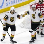 
              Vegas Golden Knights left wing Max Pacioretty, left, celebrates with right wing Mark Stone after scoring a goal during the second period of an NHL hockey game against the Chicago Blackhawks in Chicago, Wednesday, April 27, 2022. (AP Photo/Nam Y. Huh)
            
