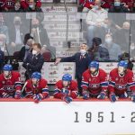 
              Montreal Canadiens players and coaches look on from the bench during the closing moments of third-period NHL hockey game action against the Boston Bruins in Montreal, Sunday, April 24, 2022. (Graham Hughes/The Canadian Press via AP)
            