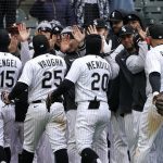 
              The Chicago White Sox celebrate the team's 7-3 win over the Kansas City Royals after a baseball game Wednesday, April 27, 2022, in Chicago. (AP Photo/Charles Rex Arbogast)
            