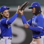 
              Toronto Blue Jays' Raimel Tapia, right, celebrates with Bo Bichette after the Blue Jays defeated the Boston Red Sox 6-1 during a baseball game, Wednesday, April 20, 2022, at Fenway Park in Boston. (AP Photo/Charles Krupa)
            