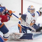 
              New York Islanders goaltender Ilya Sorokin makes a save against the Montreal Canadiens during first-period NHL hockey game action in Montreal, Friday, April 15, 2022. (Graham Hughes/The Canadian Press via AP)
            