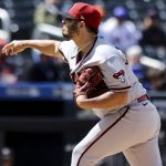 
              Arizona Diamondbacks relief pitcher Humberto Castellanos (54) delivers against the New York Mets during the first inning of a baseball game, Sunday, April 17, 2022, in New York. (AP Photo/Jessie Alcheh)
            