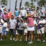 
              Lexi Thompson hits from the fairway rough on the third hole during the third round of the LPGA Chevron Championship golf tournament Saturday, April 2, 2022, in Rancho Mirage, Calif. (AP Photo/Marcio Jose Sanchez)
            