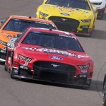 
              Chase Briscoe (14) competes in a NASCAR Cup Series auto race at Phoenix Raceway, Sunday, March 13, 2022, in Avondale, Ariz. (AP Photo/Darryl Webb)
            