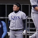 
              Tampa Bay Rays' Ji-Man Choi, center, of South Korea, watches from the dugout during the ninth inning of a baseball game against the Chicago White Sox in Chicago, Saturday, April 16, 2022. (AP Photo/Nam Y. Huh)
            