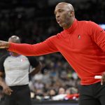 
              Portland Trail Blazers head coach Chauncey Billups gestures to his players during the first half of an NBA basketball game against the San Antonio Spurs on Sunday, April 3, 2022, in San Antonio. (AP Photo/Darren Abate)
            