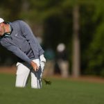 
              Scottie Scheffler hits on the 12th fairway during the third round at the Masters golf tournament on Saturday, April 9, 2022, in Augusta, Ga. (AP Photo/Matt Slocum)
            