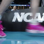 
              Players take the court before the start of a college basketball game in the semifinal round of the Women's Final Four NCAA tournament between Louisville and South Carolina Friday, April 1, 2022, in Minneapolis. (AP Photo/Eric Gay)
            