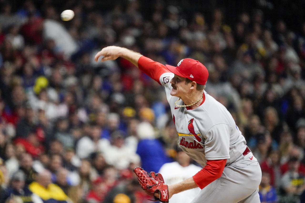 St. Louis Cardinals starting pitcher Miles Mikolas throws during the first inning of a baseball gam...