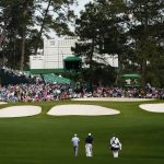 
              Justin Thomas, left, and Tiger Woods walk to the event green during a practice round for the Masters golf tournament on Monday, April 4, 2022, in Augusta, Ga. (AP Photo/Matt Slocum)
            