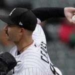 
              Chicago White Sox starting pitcher Dylan Cease grips a baseball while delivering to a Kansas City Royals batter during a game Wednesday, April 27, 2022, in Chicago. (AP Photo/Charles Rex Arbogast)
            