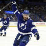 
              Tampa Bay Lightning center Steven Stamkos (91) celebrates his goal against the Toronto Maple Leafs during the second period of an NHL hockey game Thursday, April 21, 2022, in Tampa, Fla. With the goal, Stamkos became the Lightning's all-time points leader. (AP Photo/Chris O'Meara)
            