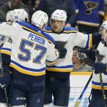 
              St. Louis Blues' Brayden Schenn (10) is congratulated after scoring a goal against the Nashville Predators in the first period of an NHL hockey game Sunday, April 17, 2022, in Nashville, Tenn. (AP Photo/Mark Humphrey)
            