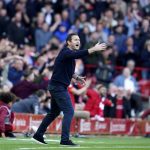 
              Everton's head coach Frank Lampard gestures during the English Premier League soccer match between Liverpool and Everton at Anfield stadium in Liverpool, England, Sunday, April 24, 2022. (AP Photo/Jon Super)
            