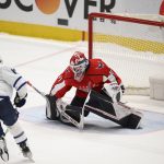 
              Toronto Maple Leafs center Alexander Kerfoot (15) scores a goal against Washington Capitals goaltender Vitek Vanecek (41) during a shootout of an NHL hockey game, Sunday, April 24, 2022, in Washington. (AP Photo/Nick Wass)
            