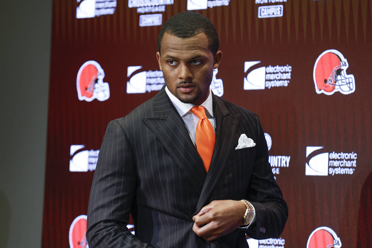 FILE - Cleveland Browns new quarterback Deshaun Watson enters a news conference at the NFL football...