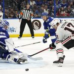 
              Tampa Bay Lightning goaltender Andrei Vasilevskiy (88) makes the save on a shot by Chicago Blackhawks center Dylan Strome (17) during the first period of an NHL hockey game Friday, April 1, 2022, in Tampa, Fla. (AP Photo/Chris O'Meara)
            