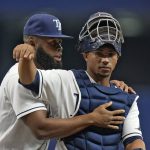 
              Tampa Bay Rays catcher Francisco Mejia, right, celebrates with Manuel Margot after the team defeated the Baltimore Orioles during a baseball game Saturday, April 9, 2022, in St. Petersburg, Fla. (AP Photo/Chris O'Meara)
            