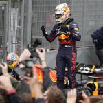 
              Red Bull driver Max Verstappen of the Netherlands celebrates after winning the Emilia Romagna Formula One Grand Prix, at the Enzo and Dino Ferrari racetrack, in Imola, Italy, Sunday, April 24, 2022. (AP Photo/Luca Bruno)
            
