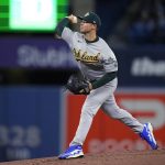 
              Oakland Athletics starting pitcher Daulton Jefferies throws to a Toronto Blue Jays batter during the first inning of a baseball game Friday, April 15, 2022, in Toronto. (Frank Gunn/The Canadian Press via AP)
            
