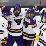 
              Minnesota State's Ondrej Pavel (18) celebrates his goal against Minnesota with Akito Hirose (2), Josh Groll (12) and Will Hillman (19) during the third period of an NCAA men's Frozen Four college hockey semifinal against Minnesota, Thursday, April 7, 2022, in Boston. (AP Photo/Michael Dwyer)
            