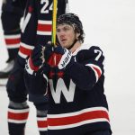 
              Washington Capitals right wing T.J. Oshie (77) salutes the fans after an NHL hockey game against the New York Islanders, Tuesday, April 26, 2022, in Washington. The Islanders 4-1. (AP Photo/Nick Wass)
            