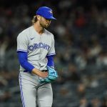 
              Toronto Blue Jays' Adam Cimber (90) reacts during the eighth inning of a baseball game against the New York Yankees, Monday, April 11, 2022, in New York. (AP Photo/Frank Franklin II)
            