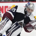 
              Colorado Avalanche goaltender Darcy Kuemper juggles the puck while making a save during the second period of the team's NHL hockey game against the Nashville Predators on Thursday, April 28, 2022, in Denver. (AP Photo/David Zalubowski)
            