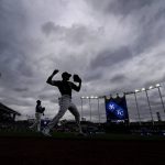 
              Kansas City Royals' Nicky Lopez warms up before a baseball game against the New York Yankees Saturday, April 30, 2022, in Kansas City, Mo. (AP Photo/Charlie Riedel)
            