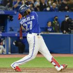 
              Toronto Blue Jays' Vladimir Guerrero Jr. watches his home run during the third inning against the Houston Astros in a baseball game Friday, April 29, 2022, in Toronto. (Christopher Katsarov/The Canadian Press via AP)
            