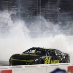 
              William Byron (24) does a burnout after he won the NASCAR Cup Series auto race at Martinsville Speedway on Saturday, April 9, 2022, in Martinsville, Va. (AP Photo/Steve Helber)
            