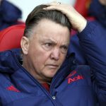 
              FILE - Manchester United's manager Louis van Gaal adjusts his hair as he waits for the start of the English Premier League soccer match between Sunderland and Manchester United at the Stadium of Light, Sunderland, England, Saturday, Feb. 13, 2016. Netherlands soccer coach Louis van Gaal has revealed that he is being treated for an aggressive form of prostate cancer but still plans to lead the team at the World Cup in Qatar in November. (AP Photo/Scott Heppell)
            