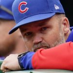 
              Chicago Cubs manager David Ross stands on the dugout steps during the first inning of a baseball game against the Pittsburgh Pirates in Pittsburgh, Wednesday, April 13, 2022. (AP Photo/Gene J. Puskar)
            
