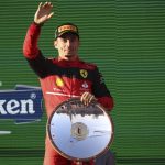 
              Ferrari driver Charles Leclerc of Monaco waves on the podium after winning the Australian Formula One Grand Prix in Melbourne, Australia, Sunday, April 10, 2022. (AP Photo/Asanka Brendon Ratnayake)
            