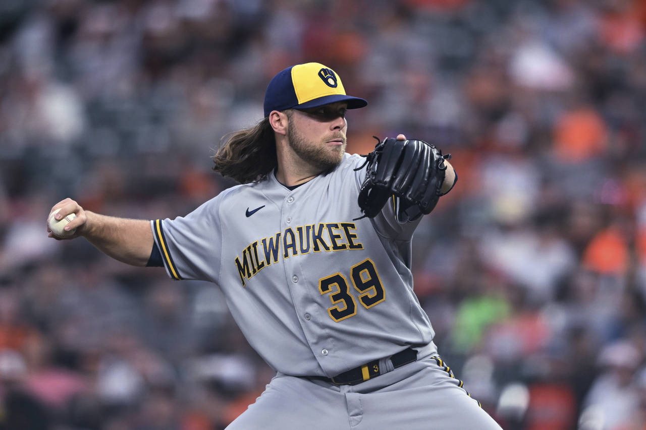 Milwaukee Brewers starting pitcher Corbin Burnes throws to a Baltimore Orioles batter during the fi...