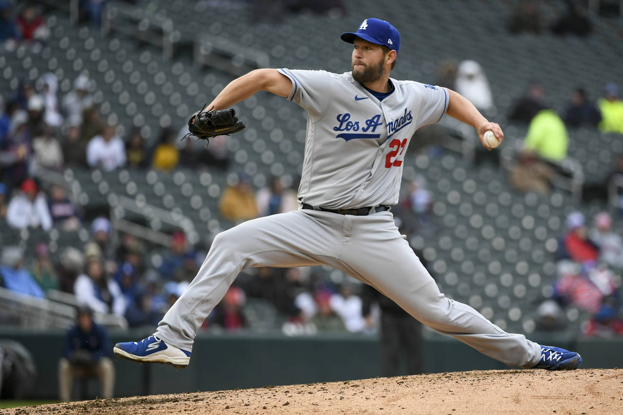 Los Angeles Dodgers pitcher Clayton Kershaw throws during the sixth inning of a baseball game again...