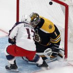 
              Columbus Blue Jackets' Justin Danforth (17) scores against Boston Bruins' Jeremy Swayman (1) during the second period of an NHL hockey game, Saturday, April 2, 2022, in Boston. (AP Photo/Michael Dwyer)
            