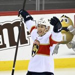 
              Florida Panthers defenseman Gustav Forsling (42) celebrates his goal during the overtime period of an NHL hockey game Saturday, April 2, 2022, in Newark, N.J. The Panthers won 7-6 in overtime. (AP Photo/Bill Kostroun)
            