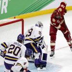 
              Denver's Ryan Barrow (18) sets up to score on Minnesota State's Dryden McKay (29) during the third period of the NCAA men's Frozen Four championship college hockey game Saturday, April 9, 2022, in Boston. (AP Photo/Michael Dwyer)
            