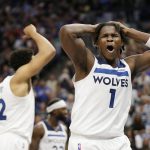 
              Minnesota Timberwolves forward Anthony Edwards (1) reacts to a foul call during the second quarter of the team's NBA basketball game against the Los Angeles Clippers on Tuesday, April 12, 2022, in Minneapolis. (AP Photo/Andy Clayton-King)
            