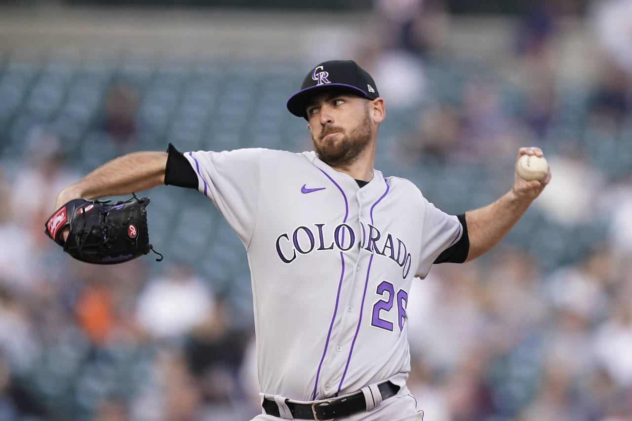 Colorado Rockies starting pitcher Austin Gomber throws during the fourth inning of the second baseb...