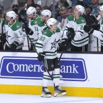
              Dallas Stars center Vladislav Namestnikov (92) is congratulated by teammates after his goal against the San Jose Sharks during the first period of an NHL hockey game Saturday, April 2, 2022, in San Jose, Calif. (AP Photo/Tony Avelar)
            