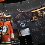 
              Fans hold signs for Anaheim Ducks' Ryan Getzlaf before the team's NHL hockey game against the St. Louis Blues Sunday, April 24, 2022, in Anaheim, Calif. Getzlaf will end a 17-year NHL career spent entirely with the Ducks at the conclusion of the season. (AP Photo/Jae C. Hong)
            