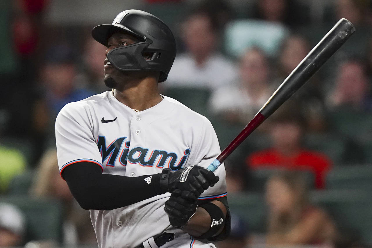 Miami Marlins right fielder Jorge Soler watches an RBI single during the sixth inning of the team's...