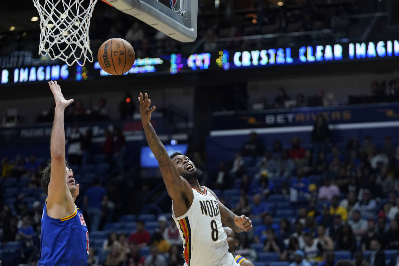 New Orleans Pelicans forward Naji Marshall (8) goes to the basket against Golden State Warriors for...