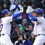
              Chicago Cubs' Patrick Wisdom, right, celebrates his two-run home run with Seiya Suzuki, off Tampa Bay Rays' Shane McClanahan during the second inning of a baseball game Monday, April 18, 2022, in Chicago. (AP Photo/Charles Rex Arbogast)
            