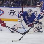 
              New York Rangers goaltender Igor Shesterkin (31) stops an attempt on goal during second period of NHL hockey game, Saturday April 16, 2022, in New York. (AP Photo/Bebeto Matthews)
            