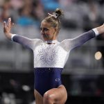 
              Auburn's Drew Watson competes on the floor exercise during the NCAA college women's gymnastics championships, Thursday, April 14, 2022, in Fort Worth, Texas. (AP Photo/Tony Gutierrez)
            